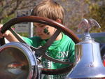Parade Youngster Working the Steering Wheel.JPG